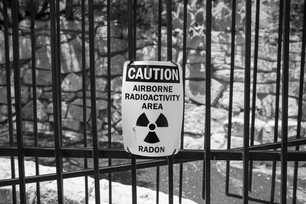Radon airborne radioactivity warning sign, Minnesota Radon Pros